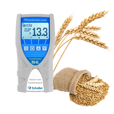 Humimeter RHL grain moisture meter measuring barley with wheat and grain sample beside device