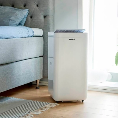 Woods Milan 9K Portable Air Conditioner in living room