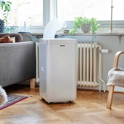 Woods Milan 9K Portable Air Conditioner in living room